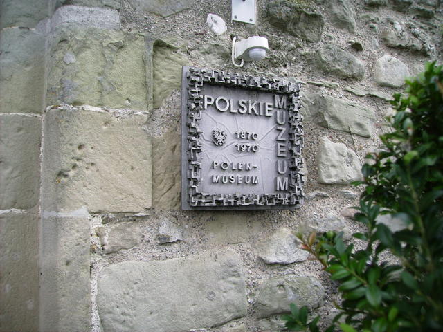 Sign on castle/museum entrance - it's a Polish museum